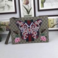 Gucci Butterfly GG supreme pouch 