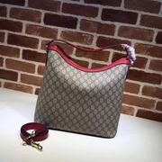 Gucci GG Supreme canvas hobo with red leather