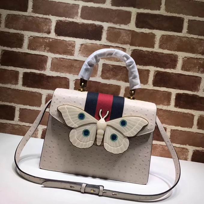  Gucci  Leather top handle bag with moth white