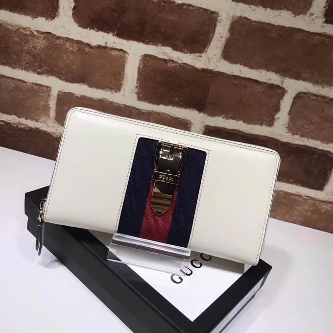  Gucci Sylvie leather zip around wallet white