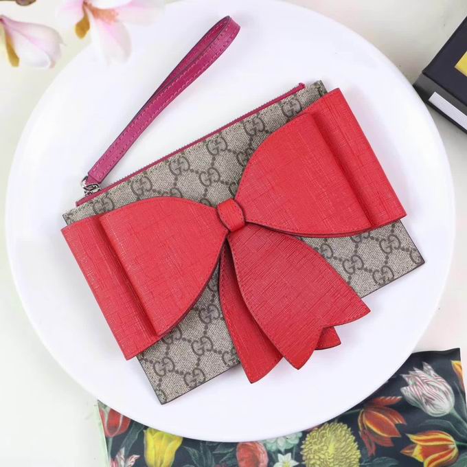  Gucci Childrens GG Supreme bow wristlet red